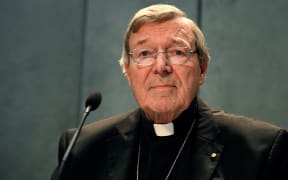 Australian Cardinal George Pell makes a statement at the Holy See Press Office in Vatican City.
