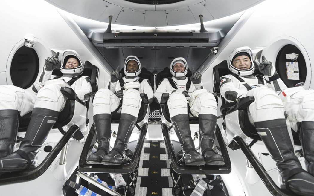 SpaceX crew, from left, NASA astronauts Shannon Walker, Victor Glover, Mike Hopkins, and JAXA (Japan Aerospace Exploration Agency) astronaut Soichi Noguchi.