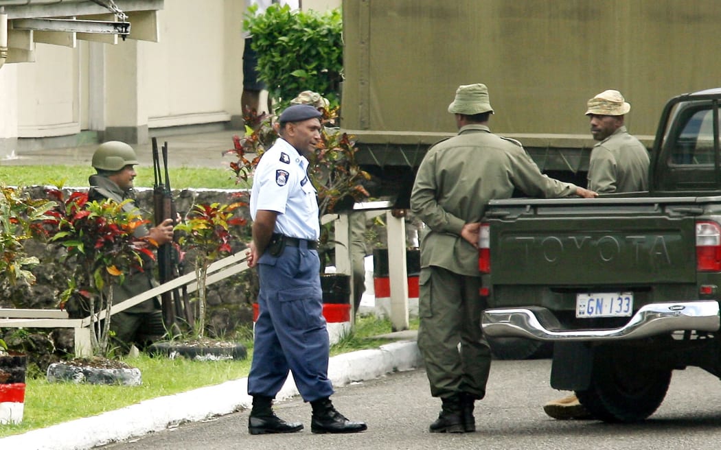 Members of Fiji police and military forces.