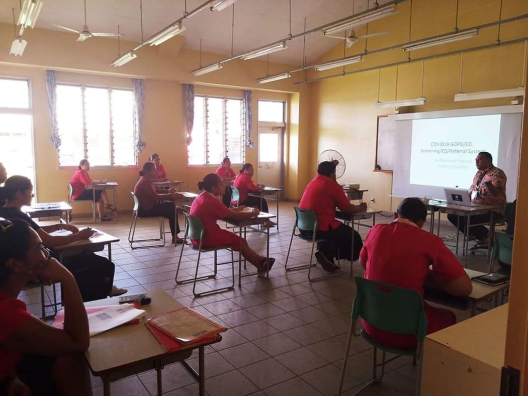 Dr. Penisimani Poloniati trains staff as part of the COVID-19 response preparations in Tonga.