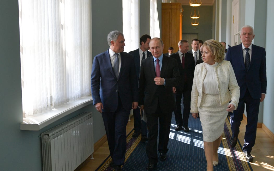 From left: State Duma Speaker Vyacheslav Volodin, Russian President Vladimir Putin, Federation Council Speaker Valentina Matvienko and Presidential Envoy to North-East federal district Alexander Gutsan arrive for a meeting with members of Lawmakers Council in St.Petersburg, Russia on 24 April, 2019.