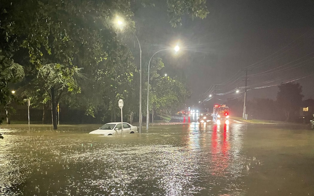 Flooding on the corner of Seabrooke and Margan Avenues in the Auckland suburb of New Lynn on 27 October 2023.