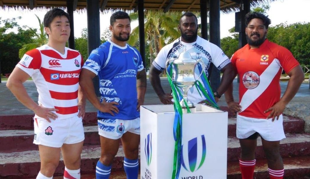 The captains pose with the World Rugby Pacific Challenge Trophy.