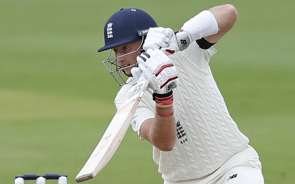 England's Joe Root watches the ball after playing a shot on the first day of the third Test cricket match between England and Pakistan at the Ageas Bowl in Southampton, southwest England on August 21, 2020.