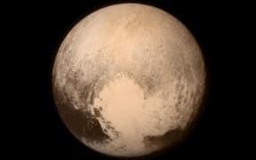 The last image of Pluto sent back by New Horizons before its closest approach to Pluto.