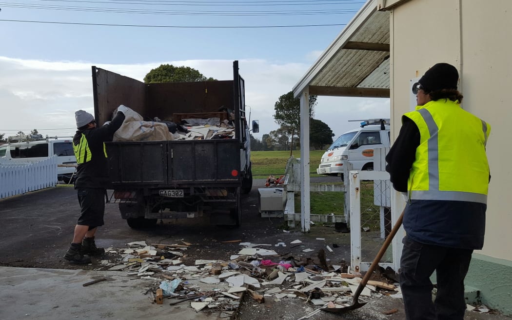 Contractors clear waste from state houses in the New Plymouth suburb of Marfell.