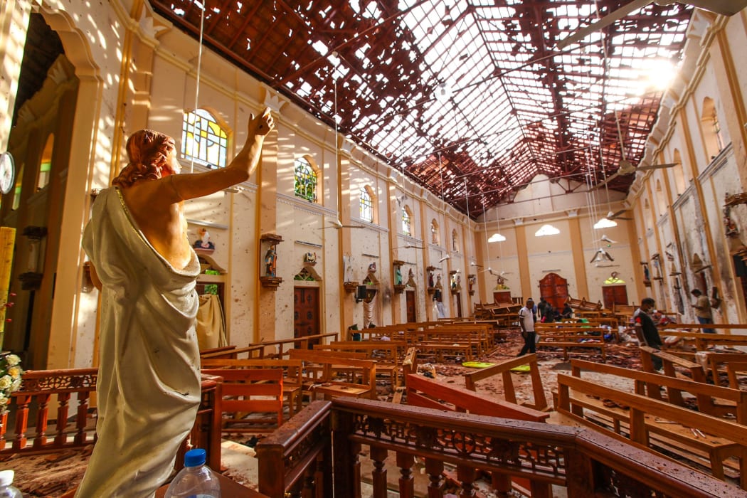Officials inspect the damaged St. Sebastian's Church after multiple explosions targeting churches and hotels across Sri Lanka on Easter Sunday, April 21, 2019 in Negombo, north of Colombo, Sri Lanka.