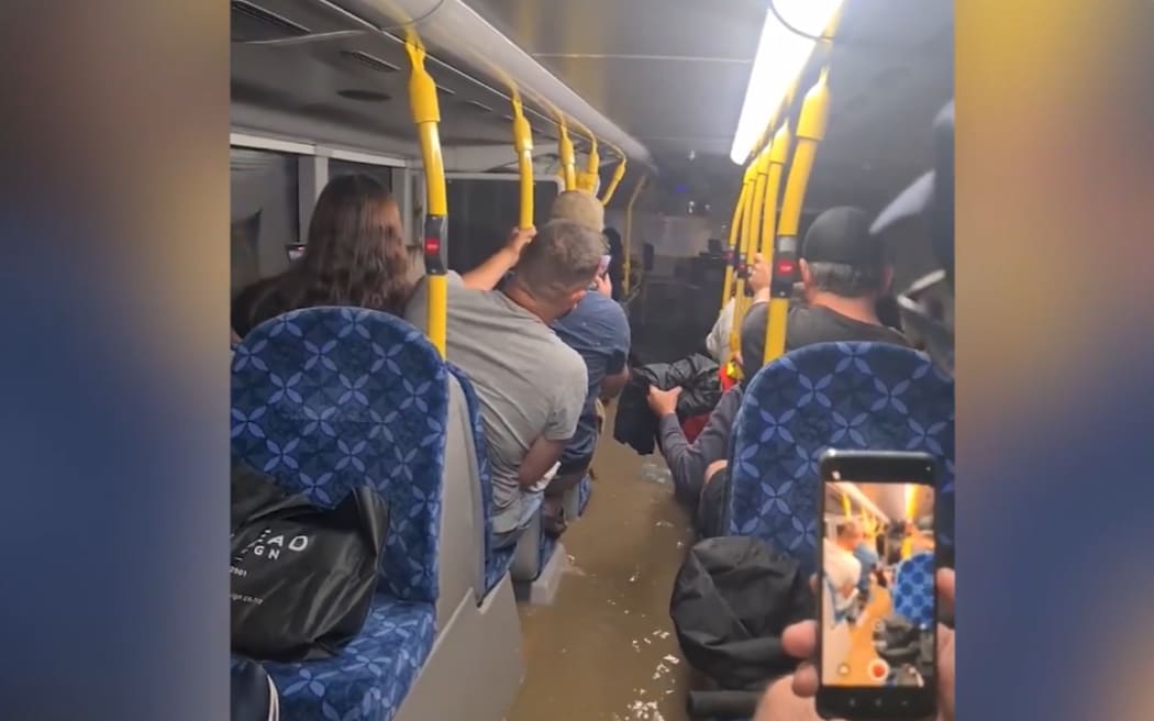 An Auckland bus taking passengers away from Mt Smart Stadium after Elton John was cancelled on Friday night flooded during the severe weather event.