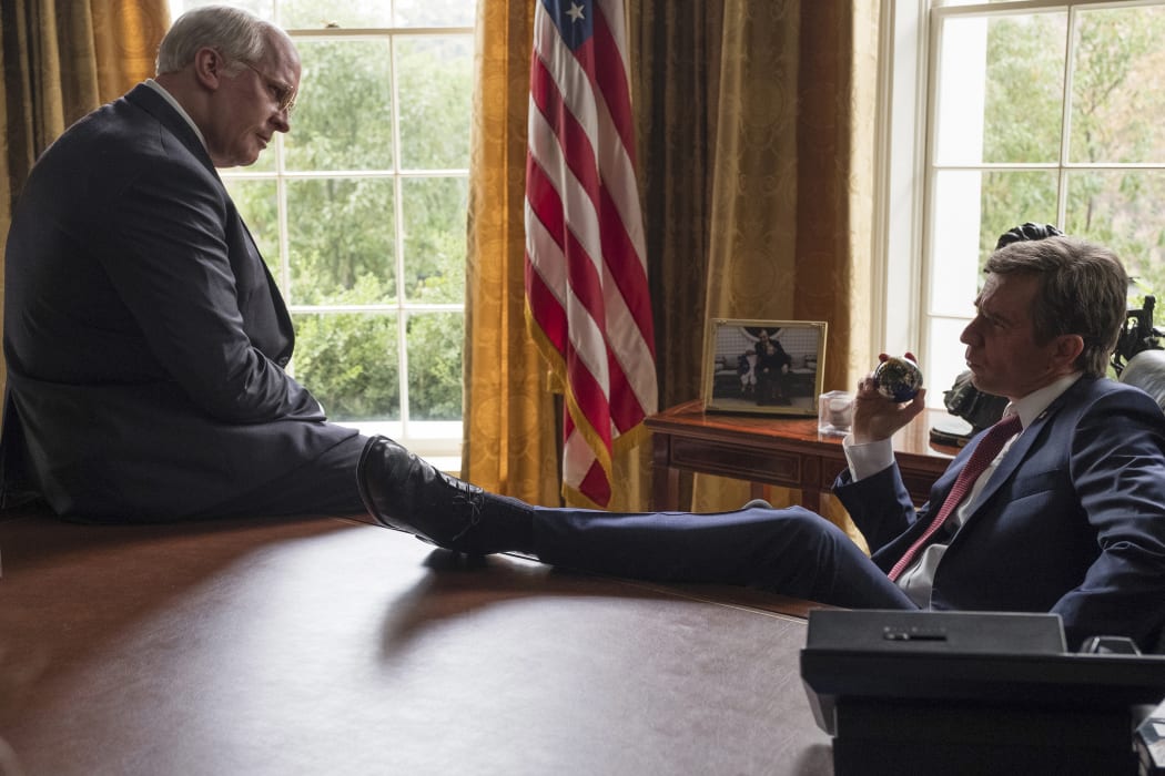 This image released by Annapurna Pictures shows Christian Bale as Dick Cheney, left, and Sam Rockwell as George W. Bush in a scene from "Vice".