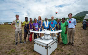 The UNICEF team with the drone on Vanuatu.