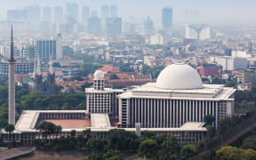 JAKARTA, INDONESIA - OCTOBER 21, 2014: Aerial view of Istiqlal Mosque. It is the largest mosque in Southeast Asia.
