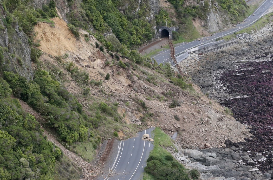 An aerial photo showing earthquake damage to State Highway 1 near Ohau Point.