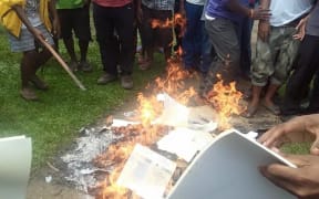 PNG ballot papers were burnt at the University of Technology polling booth on campus.