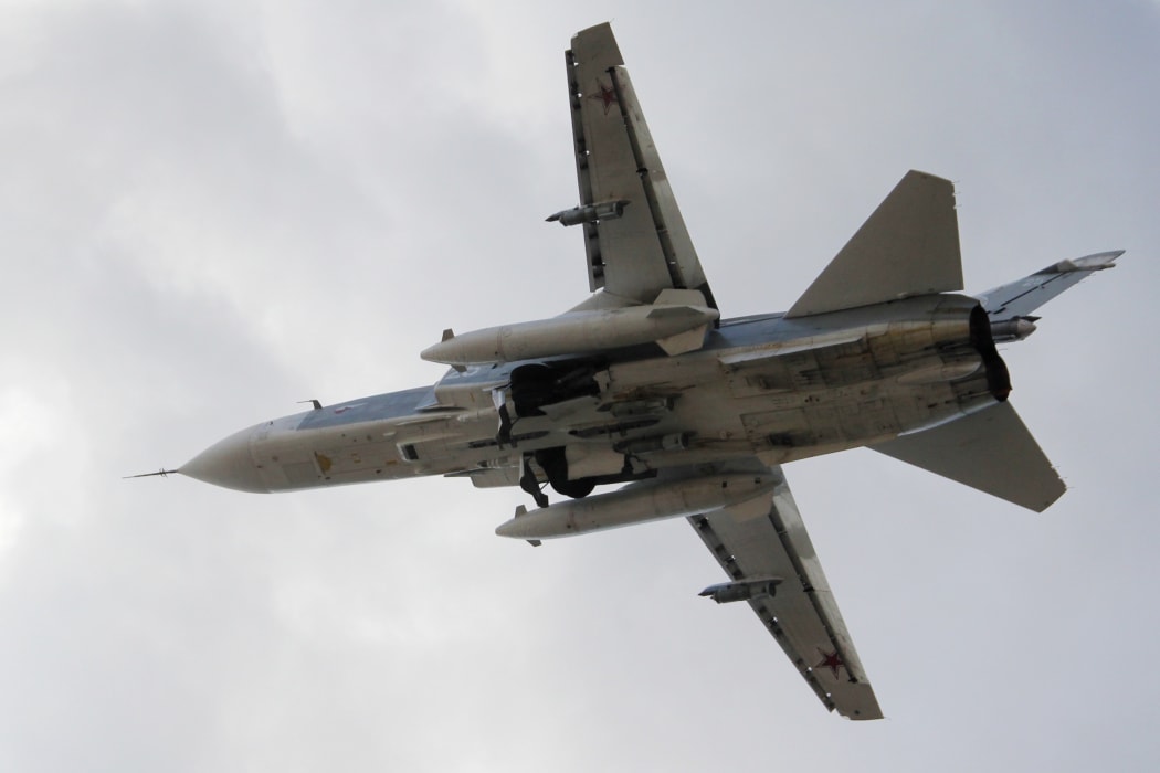 A Russian Su-24 front-line bomber jet takes off at Latakia Airport, Syria.