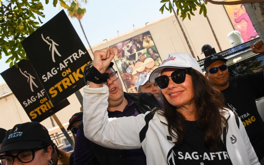 SAG-AFTRA President Fran Drescher joins Writers Guild members at a picket line outside of Warner Bros studio in Burbank, California.