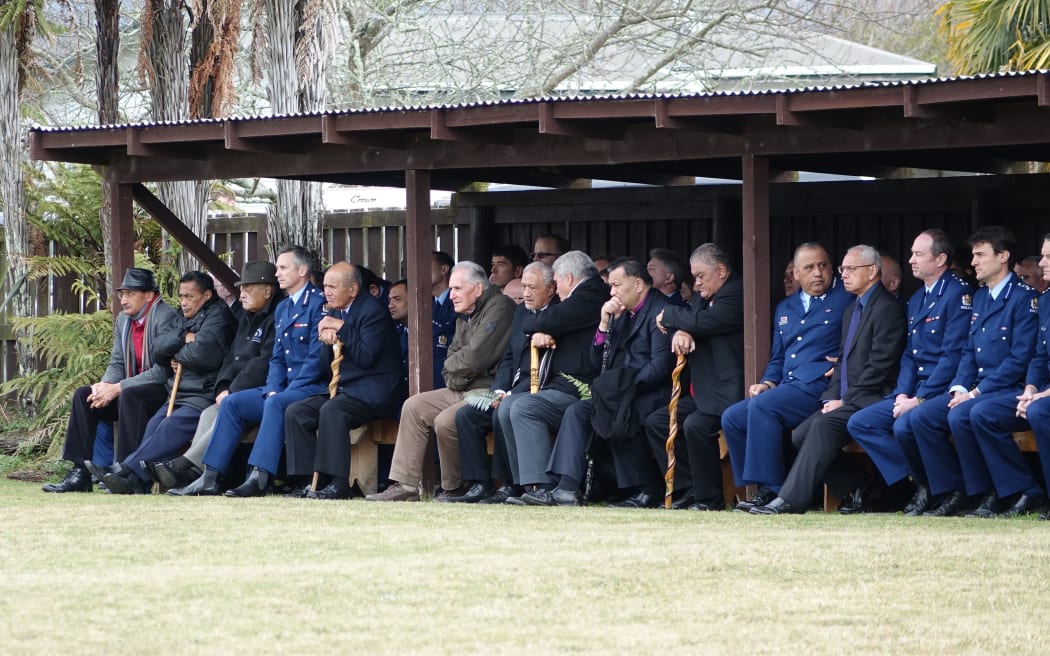 Police Commissioner Mike Bush (4th left) and kaumatua on Te Rewarewa Marae.