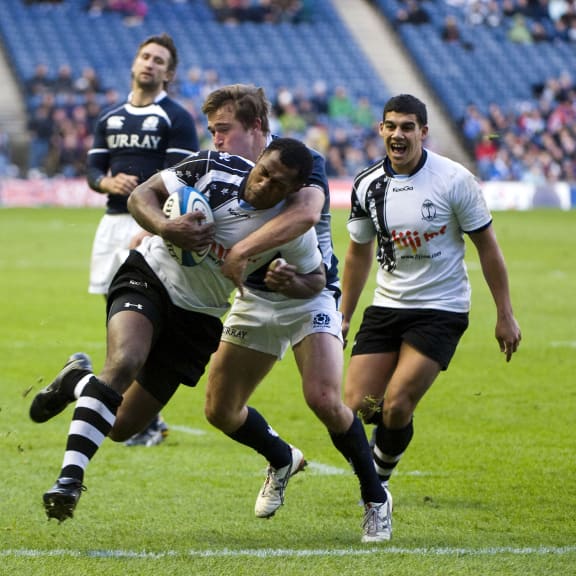 Vereniki Goneva scores against Scotland in 2009. The Flying Fijians will are yet to win at Murrayfield in four attempts.