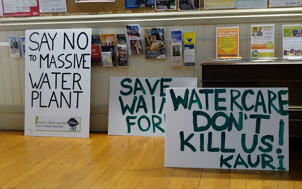 Signs at Watercare's board meeting.