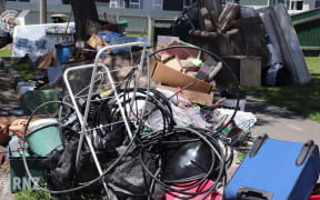 Piles of rubbish left after Napier floods