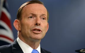 Australia's Prime Minister Tony Abbott speaks at a press conference in Sydney on 19 September 2014.