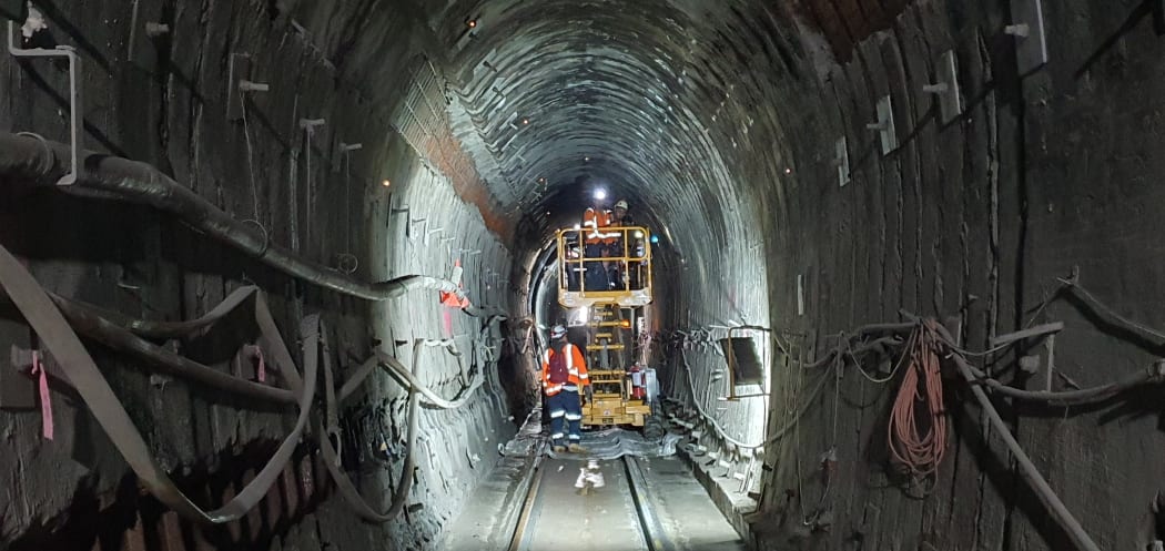 Tunnel 2, about 15km north of Helensville on the North Auckland Line, has the least clearance of any of the 100 tunnels on the KiwiRail network. Here, workers are re-profiling the lining to enable hi-cube containers on wagons to pass through.
