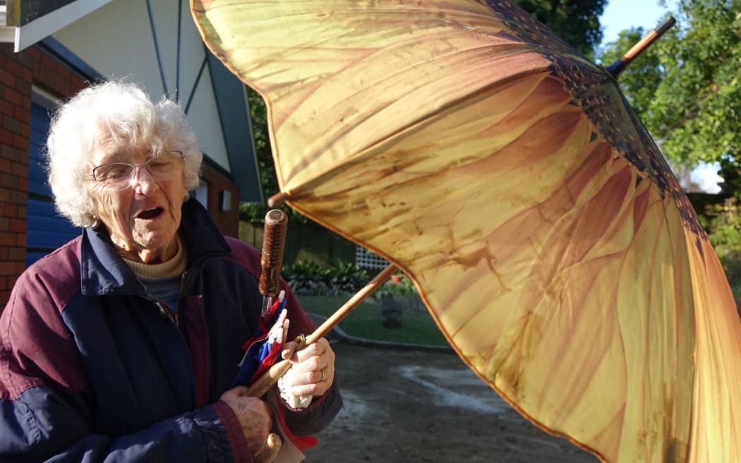 Joy Bassett was overjoyed to salvaged her favourite umbrella from her written-off car.