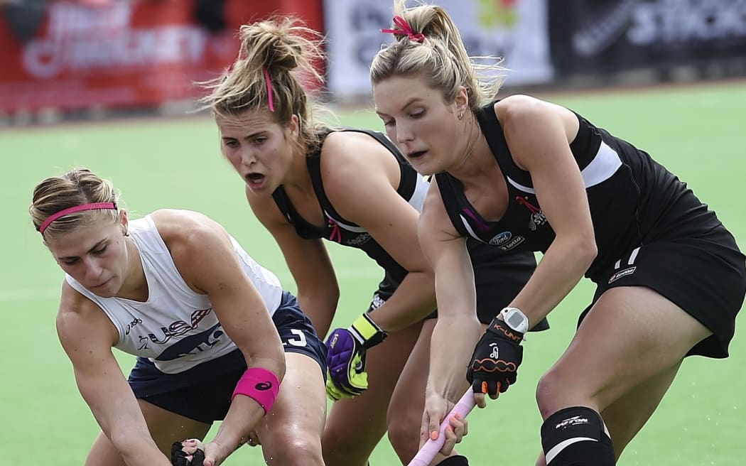Rose Keddell and Sophie Cocks of New Zealand fight for possession with Katelyn Falgowski