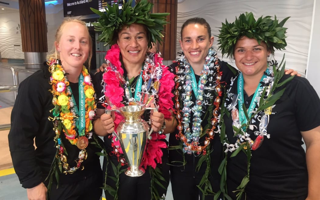 Members of the victorious Black ferns team after their arrival at Auckland Airport.