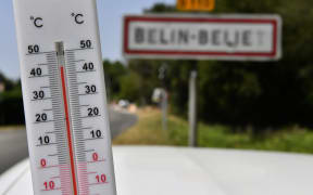 A thermometer placed in the village of Belin-Béliet, south western France, shows the temperature on July 23, 2019.