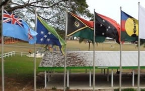 Flags of  Melanesian Spearhead Group member states. From left: flags of Fiji, Solomon Islands, Vanuatu, Papua New Guinea, FLNKS (New Caledonia's indigenous Kanak movement).