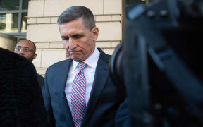 (FILES) In this file photo taken on December 18, 2018 former National Security Advisor General Michael Flynn leaves after the delay in his sentencing hearing at US District Court in Washington, DC.