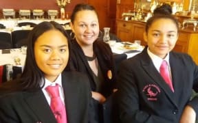 Misty Harrison (centre) with her two nieces Ngawai Kowhai Harrison (left) and Te Waiata Harrison Mason (right)