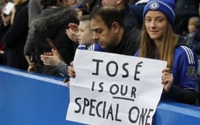 Fans show their support for sacked manager Jose Mourinho during the English Premier League football match between Chelsea and Sunderland.