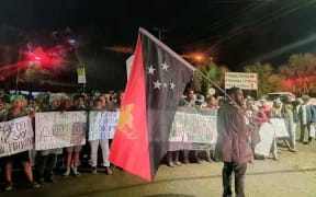 Students from the University of Goroka stage an early morning protest against the signing of a PNG-US Bilateral Defense Cooperation Agreement. 22 May 2023