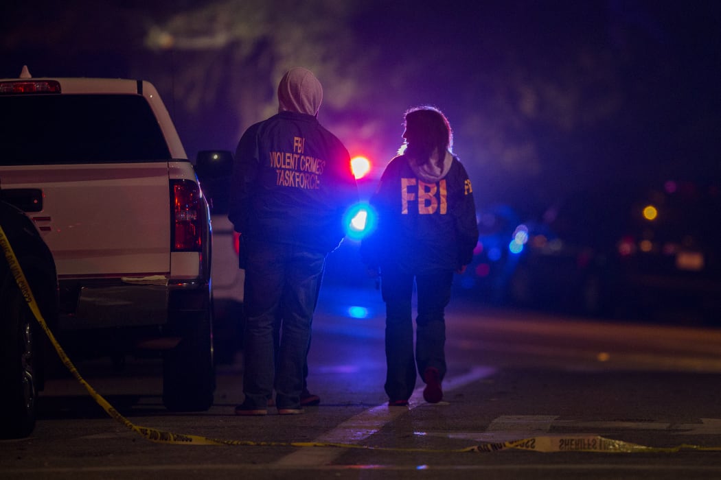 THOUSAND OAKS, CA - NOVEMBER 08: F.B.I. agents monitor the scene near the Borderline Bar and Grill, where a mass shooting occurred, on November 8, 2018 in Thousand Oaks, California.