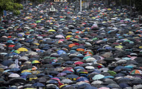 Thousands of demonstrators gather at Victoria Park area during a protest organised by the Civil Human Rights Front, in Hong Kong, China on 18 August, 2019.