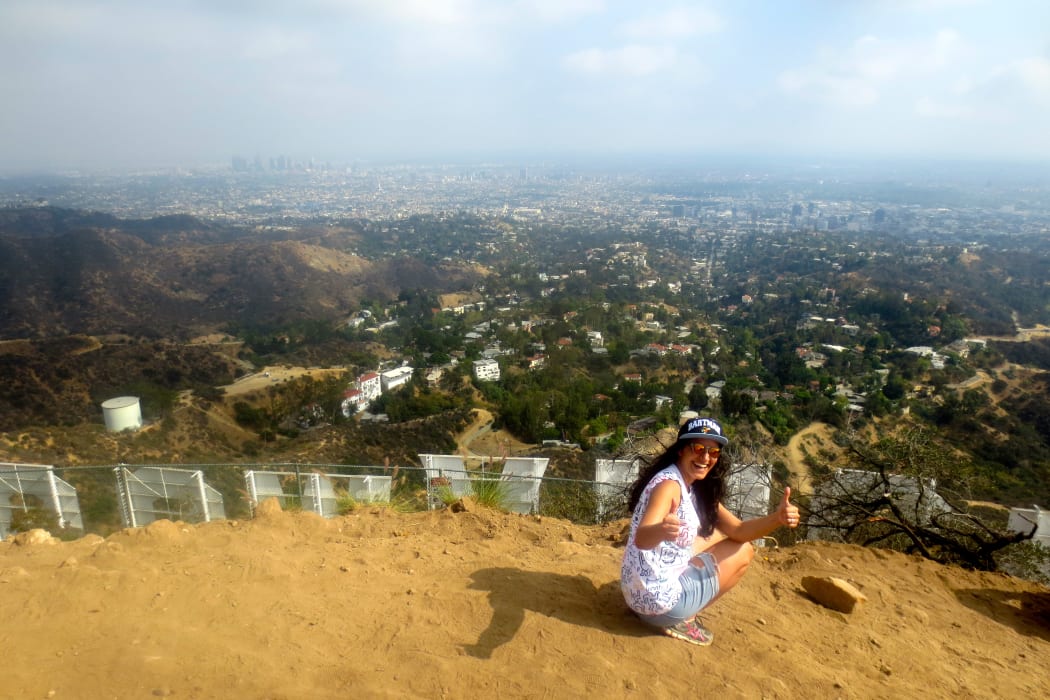Madeleine Sami above Los Angeles' Hollywood Sign