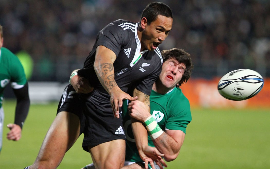 NZ Maori's Hosea Gear is tackled by Ireland's Shane Horgan, Rotorua, 2010.