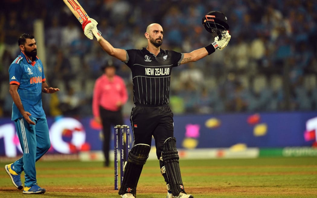 New Zealand's Daryl Mitchell celebrates his century during the ICC Cricket World Cup 2023 Semi-Finals 1 match between New Zealand and India at the Wankhede Stadium in Mumbai, Maharashtra, India. Wednesday, 15 November 2023. Copyright Photo: Raghavan Venugopal / www.photosport.nz