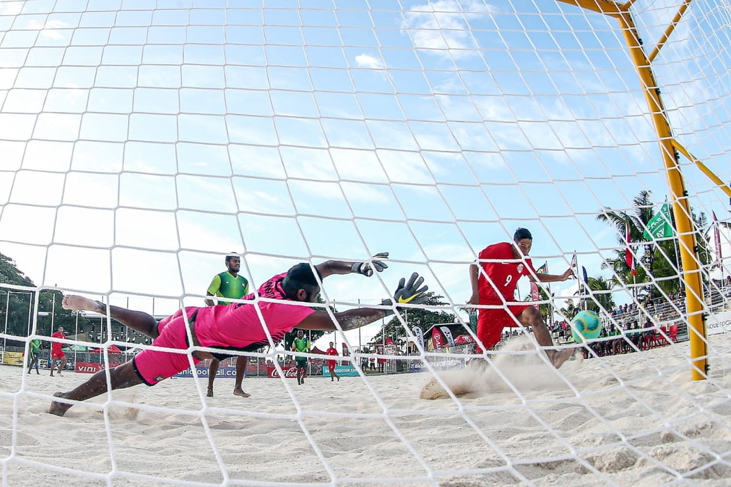 Tahiti's Heirauarii Salem scores the opening goal of their match against Vanuatu at the OFC Beach Soccer Nations Cup 2019.