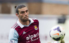 Andy Carroll in action in the Premier League for West Ham