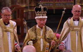Britain's King Charles III with the St Edward's Crown on his head attends the Coronation Ceremony inside Westminster Abbey in central London on May 6, 2023. - The set-piece coronation is the first in Britain in 70 years, and only the second in history to be televised. Charles will be the 40th reigning monarch to be crowned at the central London church since King William I in 1066. Outside the UK, he is also king of 14 other Commonwealth countries, including Australia, Canada and New Zealand. Camilla, his second wife, will be crowned queen alongside him and be known as Queen Camilla after the ceremony. (Photo by Richard POHLE / POOL / AFP)