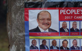 Election campaign poster for Papua New Guinea's People's National Congress Party, led by Peter O'Neill.