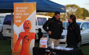 A stand at the Kaikohe markets encouraging people to sign-up to vote.