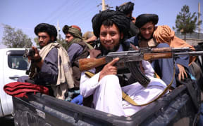 Taliban members set checkpoints around Hamid Karzai International Airport in Afghan capital Kabul on 2 September 2021.