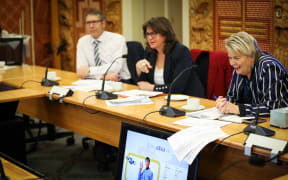 National MPs Nicky Wagner (right), Denise Lee, (center) and Stuart Smith (left) talk Star Trek in their Maori for MPs class at Parliament.