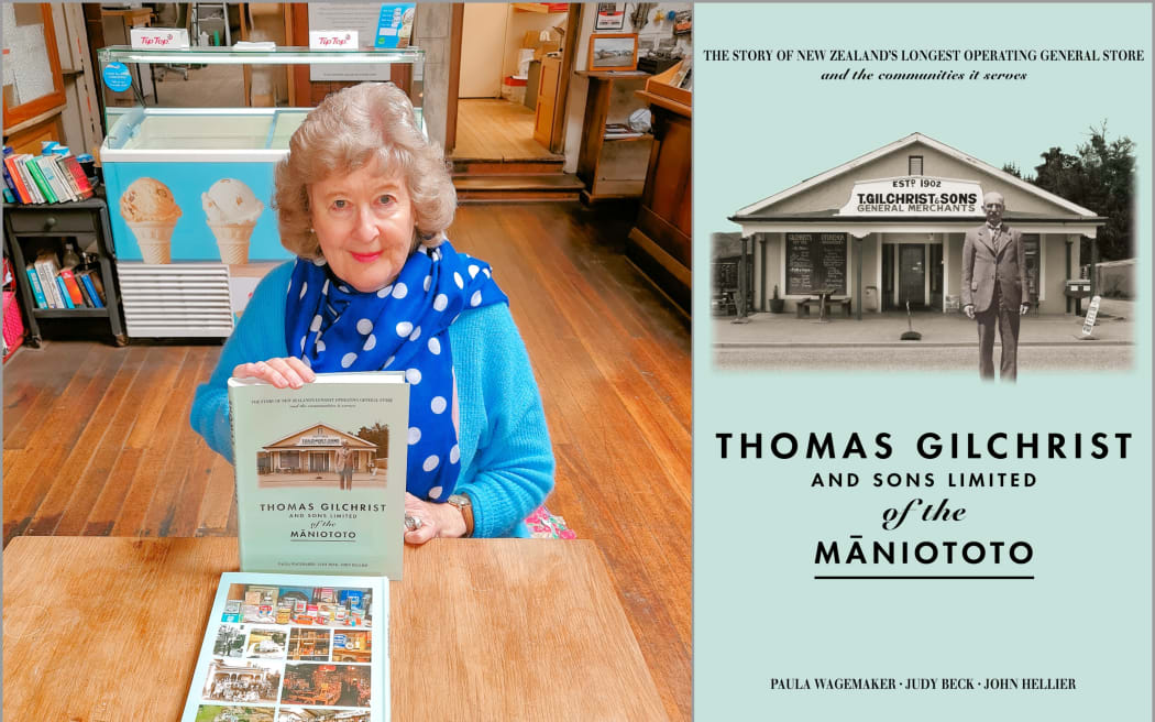 Paula Wagemaker in Gilchrist's Store with her book