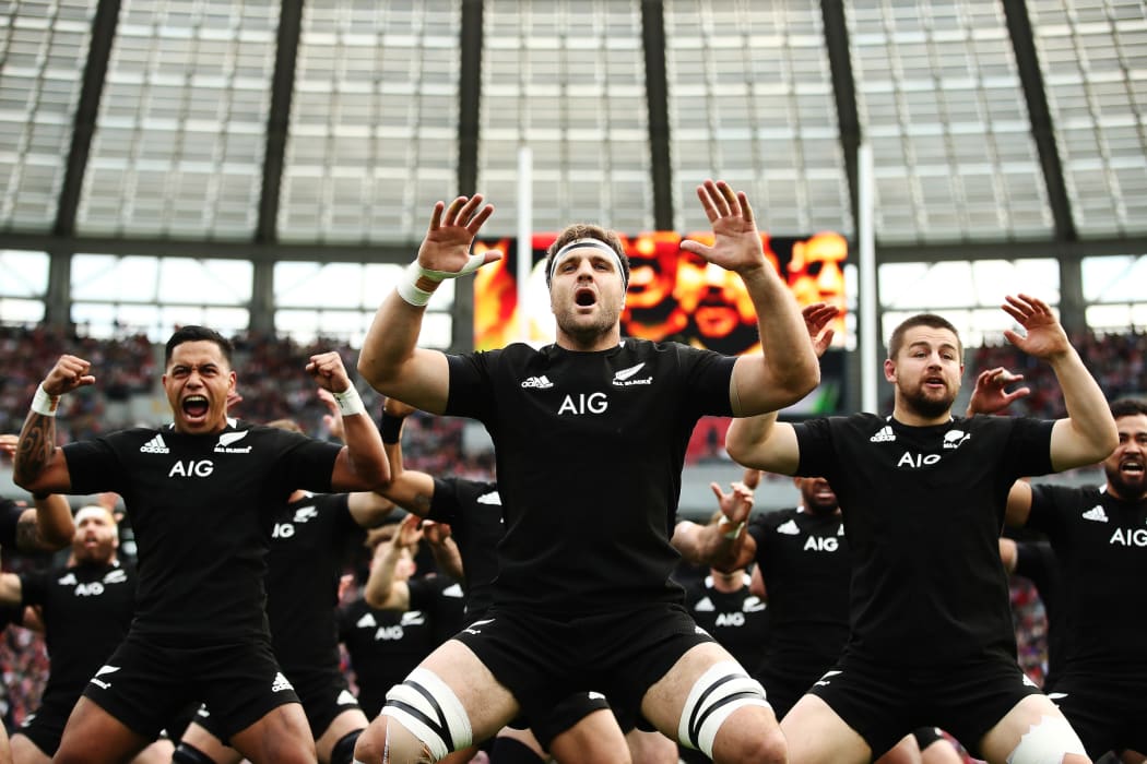 The All Blacks perform the haka ahead of the test match with Japan at Tokyo Stadium.