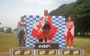 Vakasiuola, middle, was competing at her first Pacific Games.