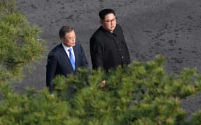 SEOUL; SOUTH KOREA - APRIL 27: South Korean president, Moon Jae-in (L) and North Korean leader Kim Jong-un